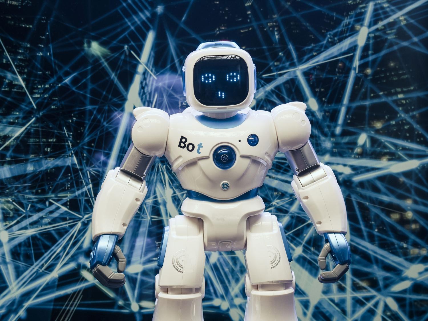 Robot humanoide moderno con un fondo de red digital, simbolizando la naturaleza de los agentes de IA autónomos.